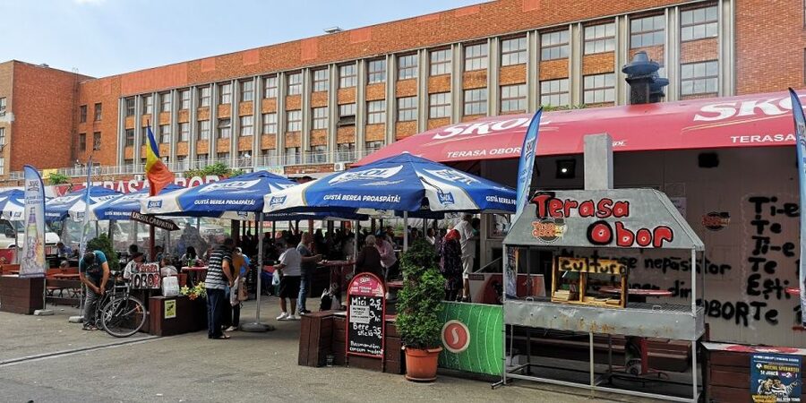Bucharest: Street Food Tour with a Local Guide - Mici and beer at a well-known market stall