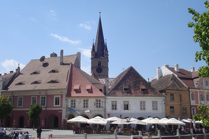 City Tour Sibiu in English - Brukenthal Museum and Council Tower views from street level