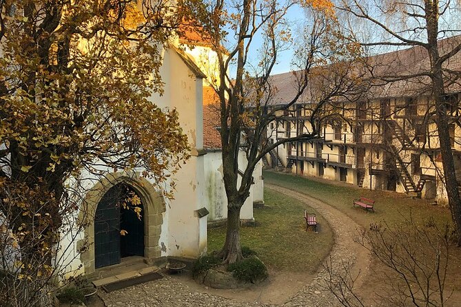 Experience the History of Bran Castle and Saxon Fortifications in Burzenland - Harman’s basilica, moat, and old paintings