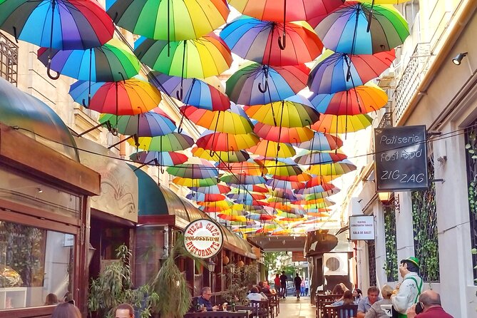 Footprints of Bucharest: History, Communism & Urban Tales - A grand avenue lined with power