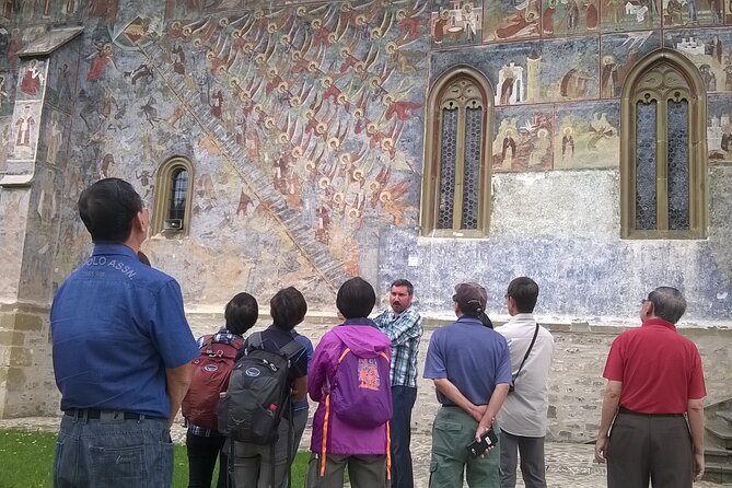 Half Day Tour to Bucovina Painted Monasteries - Humor Monastery, red-brown walls and an unusual devil