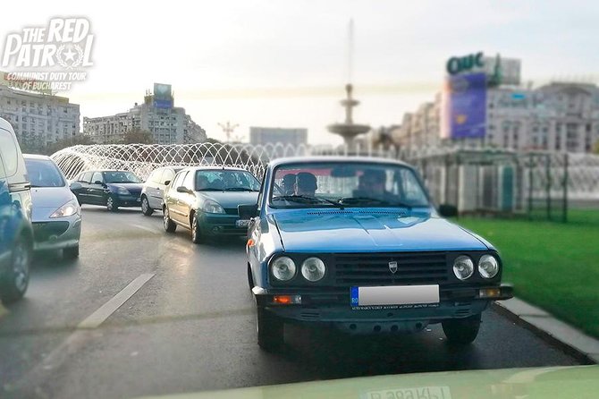 Private - Romanian Vintage Car Driving Tour of Bucharest 120 min - Revolution Square sets the tone