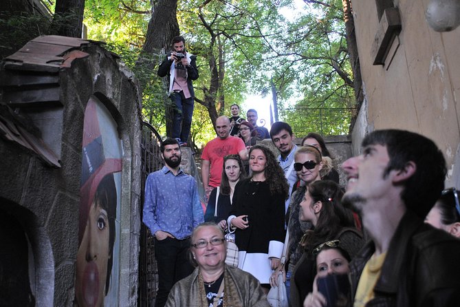 Private Walking Tour: Essential Bucharest + Hidden Gems - Bulevardul Libertății and the cost of a new city center